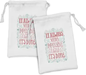 Ambesonne Saying Fabric Pouch Set of 2, Hand Drawn Swirls and Curls It Seems Impossible Until Its Done, Small Drawstring Bag for Toiletries Masks and Favors, 9" x 6", Dark Coral Pale Blue