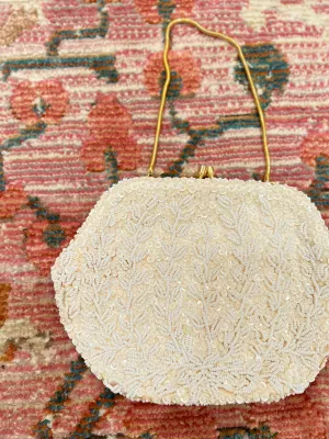 Beaded vine clutch