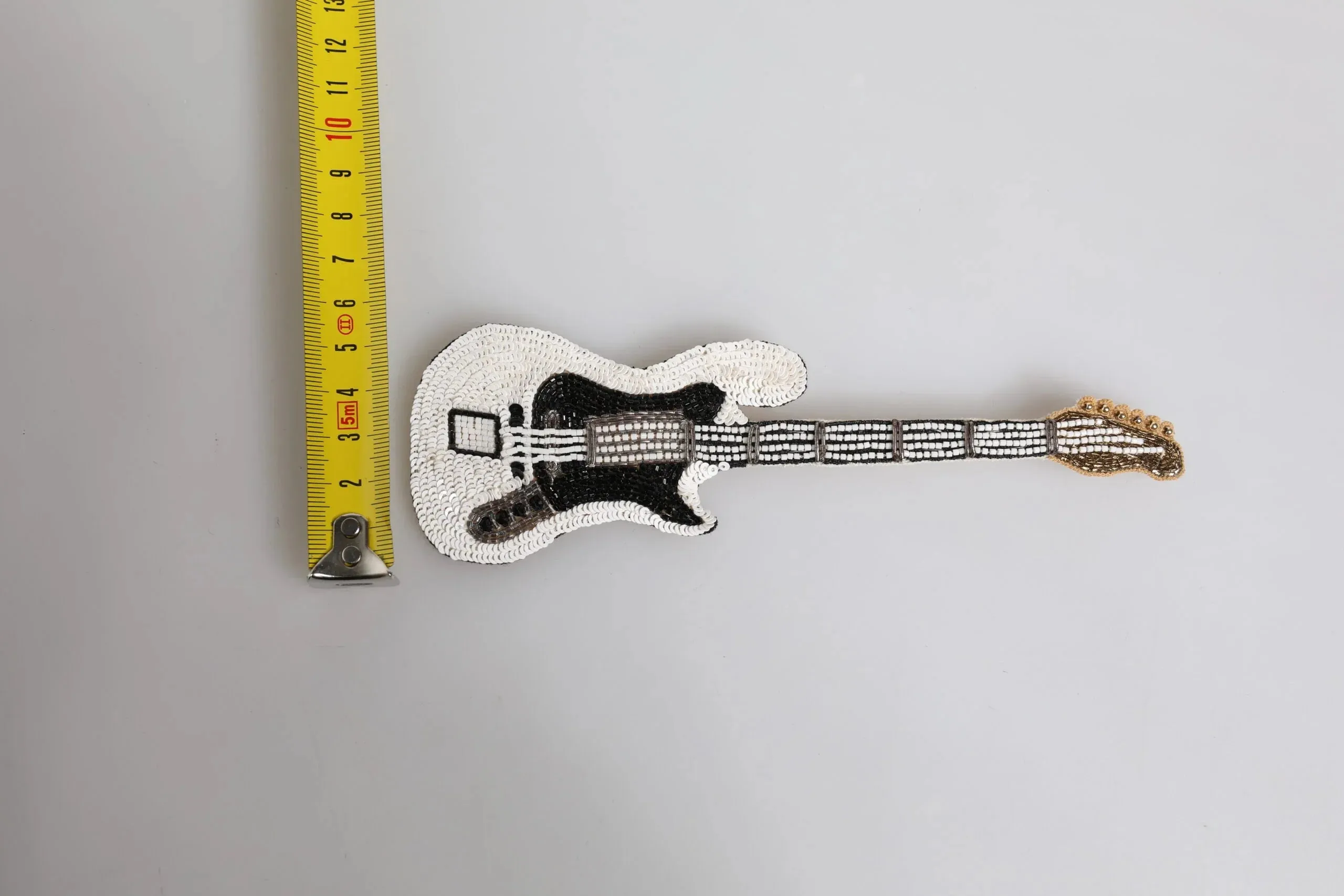 Dolce & Gabbana Gold Brass Logo Beaded Guitar Pin Brooch
