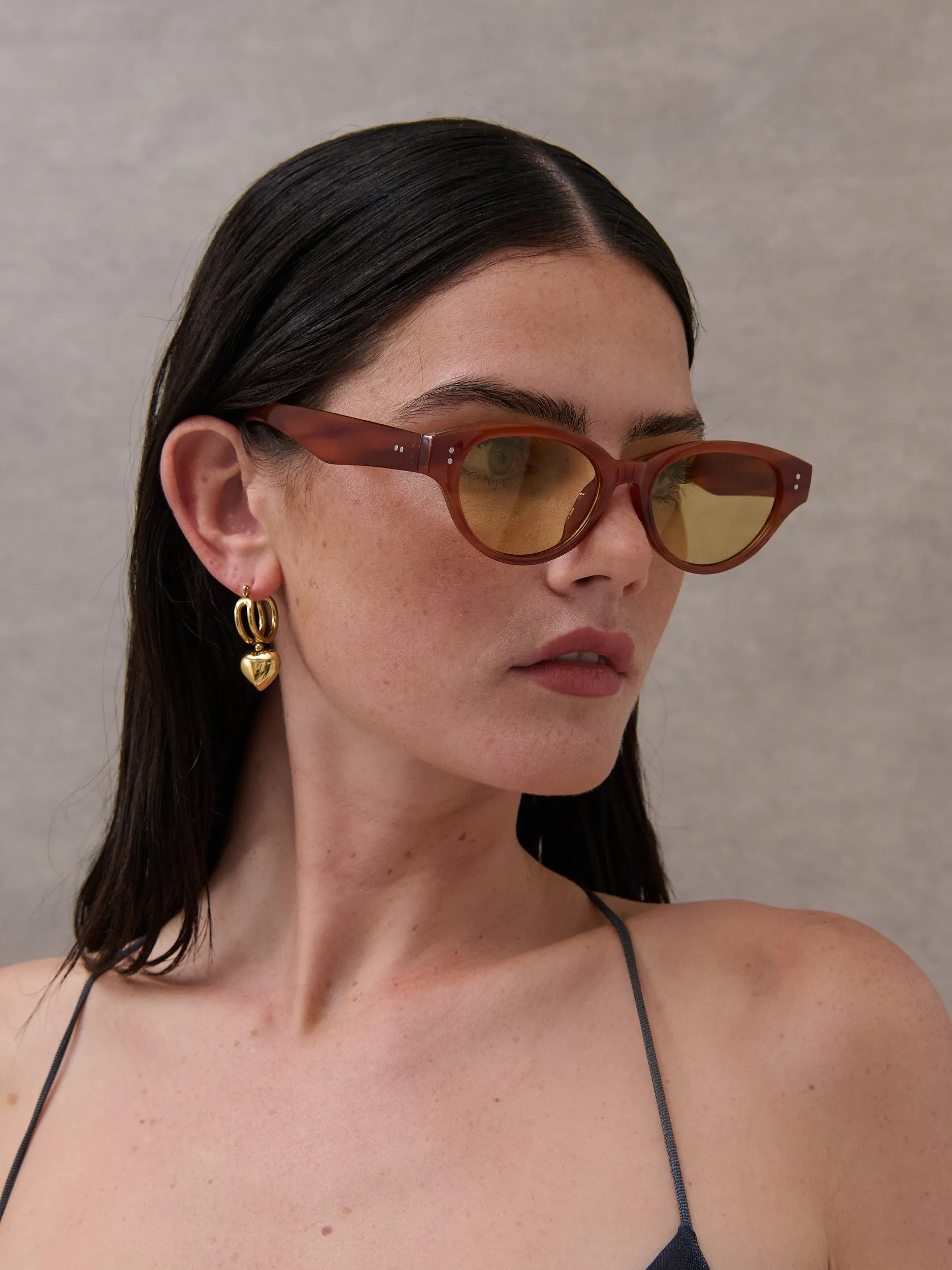 Megan Oval Frame Sunglasses in Tort