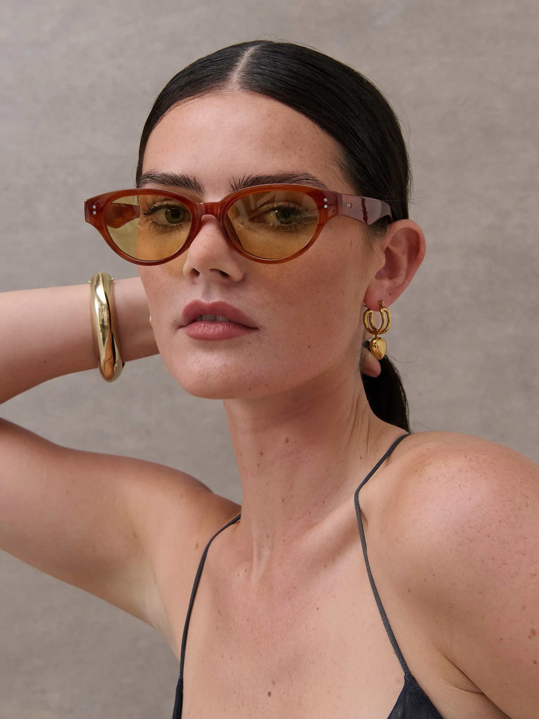 Megan Oval Frame Sunglasses in Tort