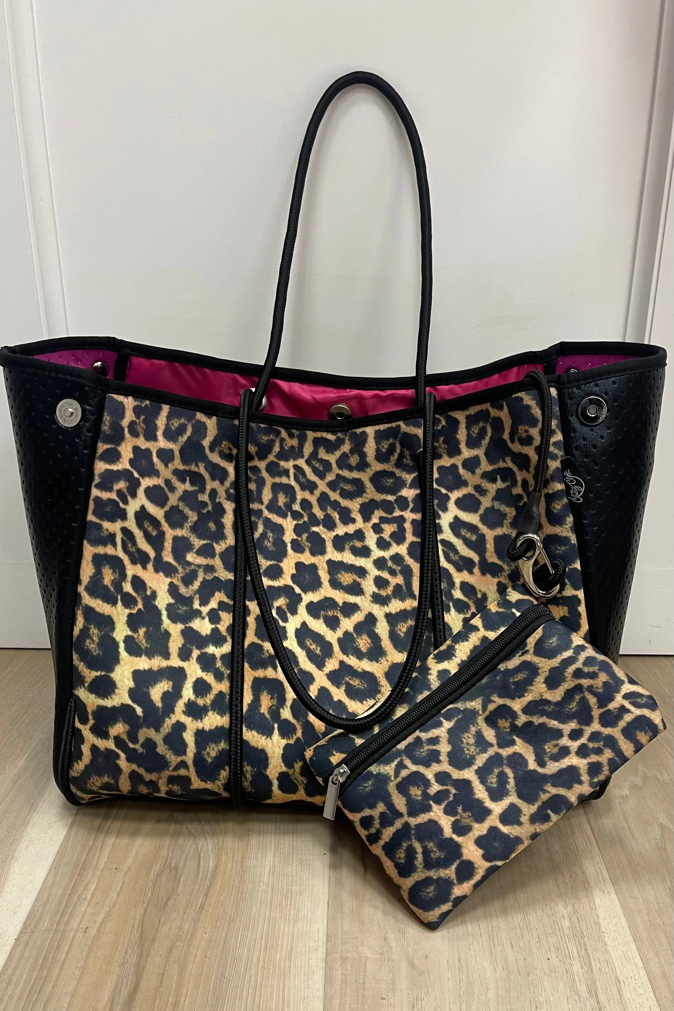 neoprene tote cheetah   black leather w/ hot pink inside lining