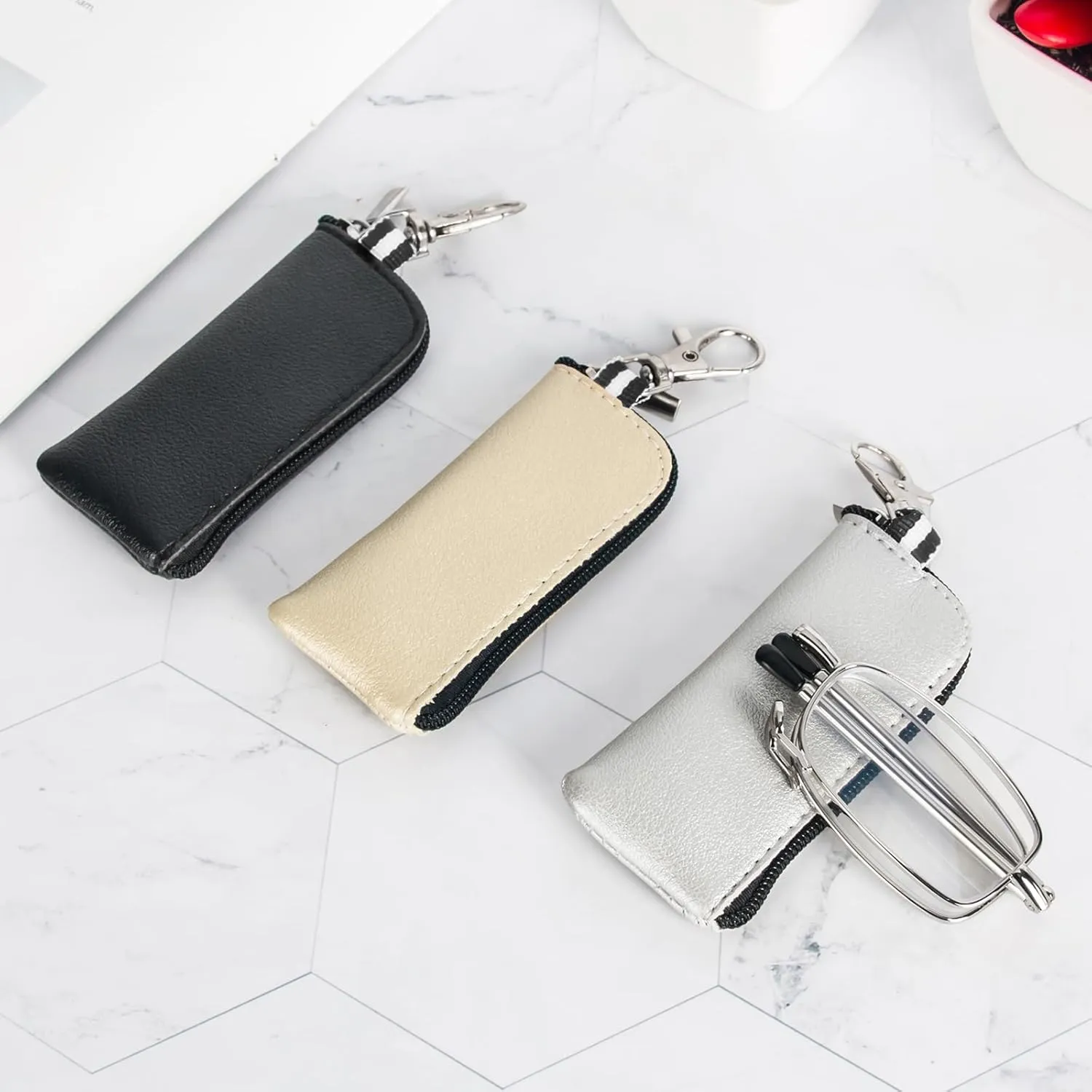 REAVEE 3 Pack Folding Reading Glasses with Keychain Compact Bags for Women Men, Blue Light Blocking Spring Hinge Portable Pocket Readers, Black Gold and Silver 1.0