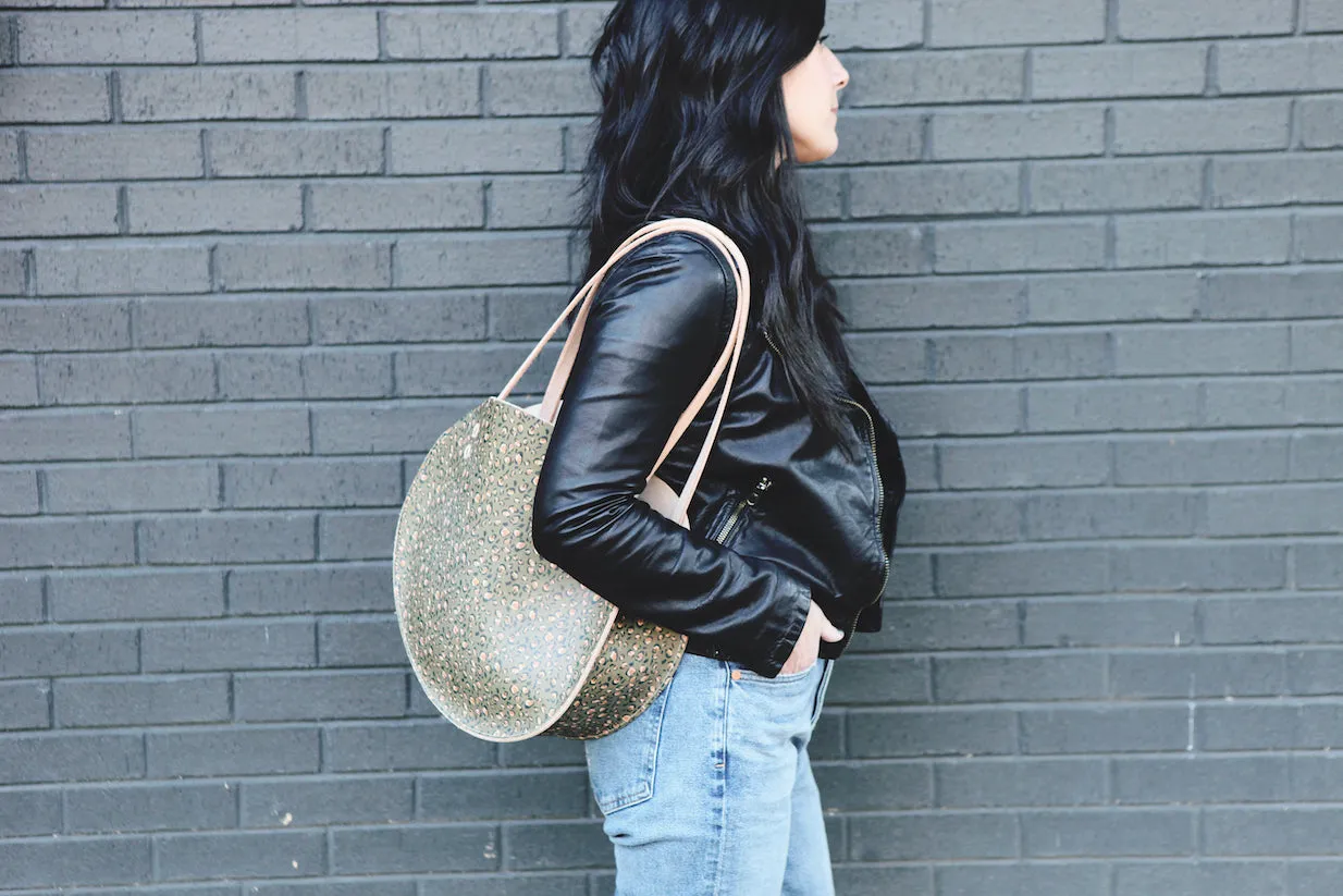 the roundabout, olive leopard print