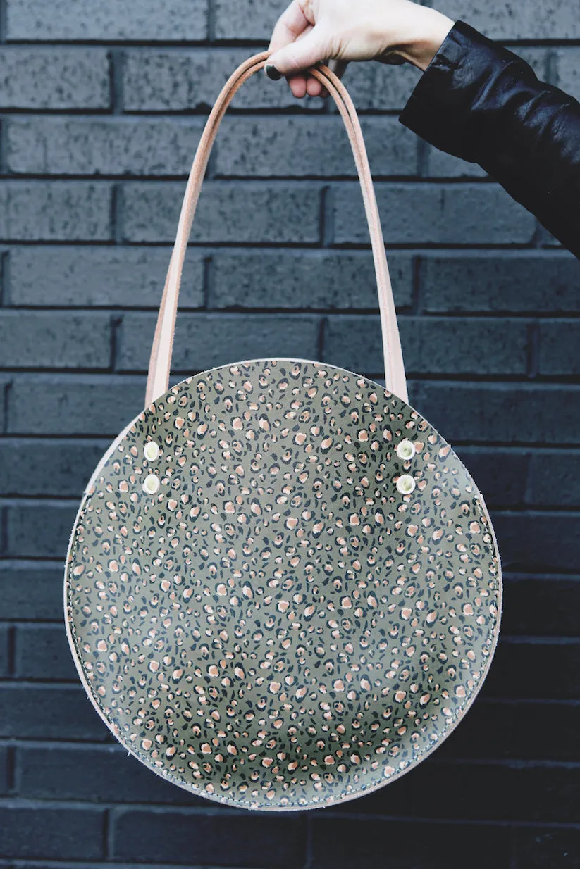 the roundabout, olive leopard print